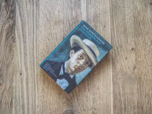 Ein Buch mit dem Bild eines Mannes mit Hut.